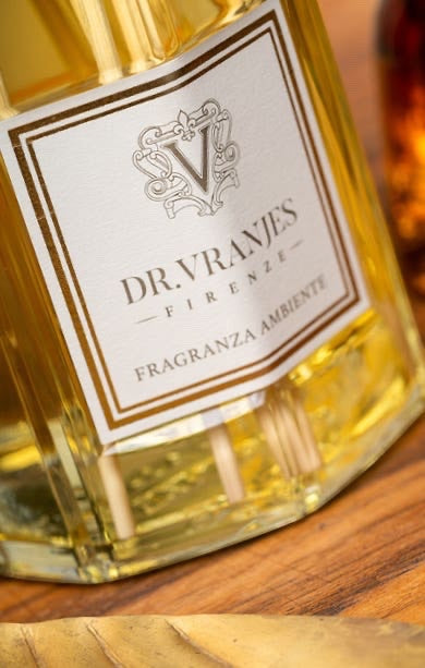 Eclectic Dr Vranjes Ambra diffuser refill bottle featuring elegant gold branding and warm amber fragrance oil