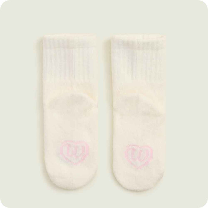 warmies pink axolotl knit baby sock logo detail