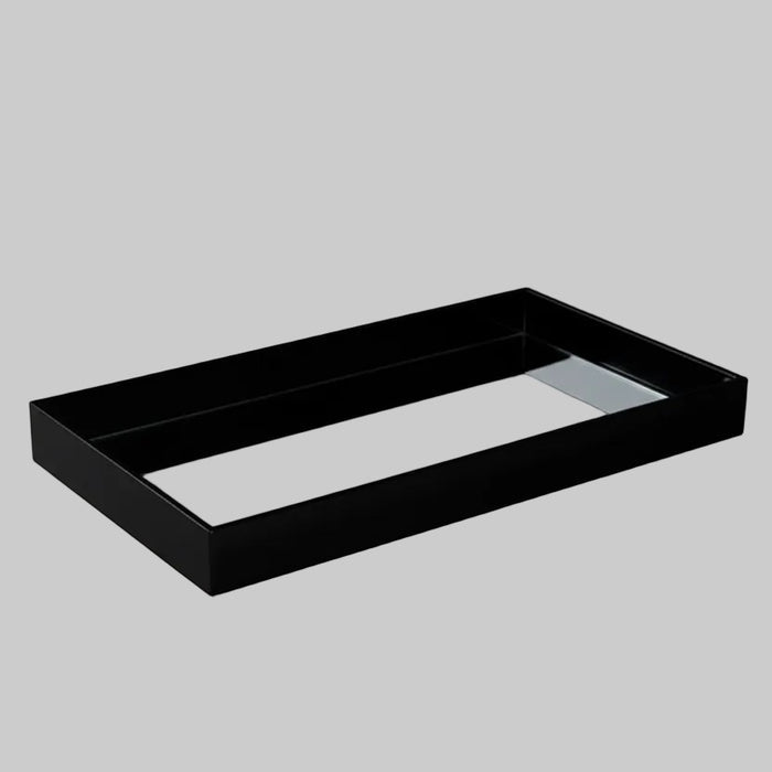 Eclectic black acrylic rectangular display tray with a polished mirrored base for elegant home decor styling.