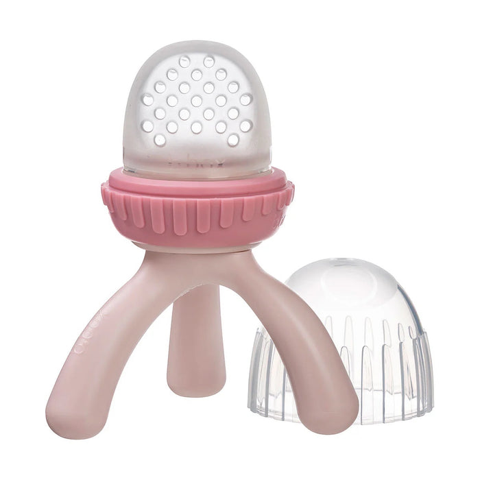 Eclectic B.Box blush silicone fresh food feeder with tripod base and protective cap for safe baby self-feeding