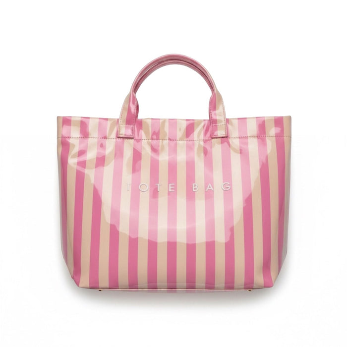 Eclectic blush and neutral striped PVC carry tote bag with fixed shoulder straps and magnetic closure.