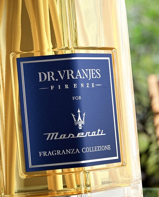 Eclectic Dr Vranjes Maserati diffuser refill bottle with blue label and brand logo, featuring included reed sticks.
