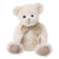 Eclectic Bukowski Bears Noah teddy bear in soft cream plush fur with a tan bow, sitting against a white background.