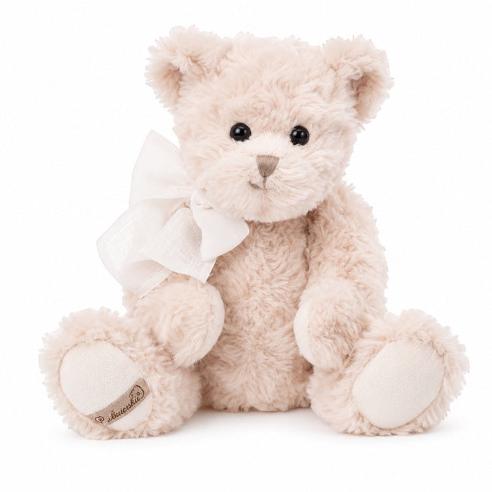 Eclectic Bukowski Bears Pierrot plush teddy bear in soft blush pink with an elegant white bow and embroidered paw.