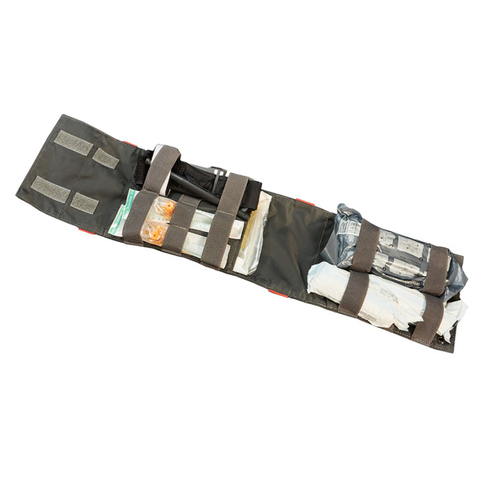 A gray Tasmanian Tiger head rest IFAK with various first aid products attached.