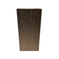 Eclectic tall earth brown ceramic floor vase with a vertical ribbed texture and architectural tapered silhouette.