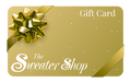 Gold gift card with a bow from 'The Sweater Shop' on a white background