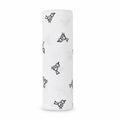 Eclectic Aden + Anais Twitter Bird muslin swaddle blanket in white with a black bird pattern, rolled up.