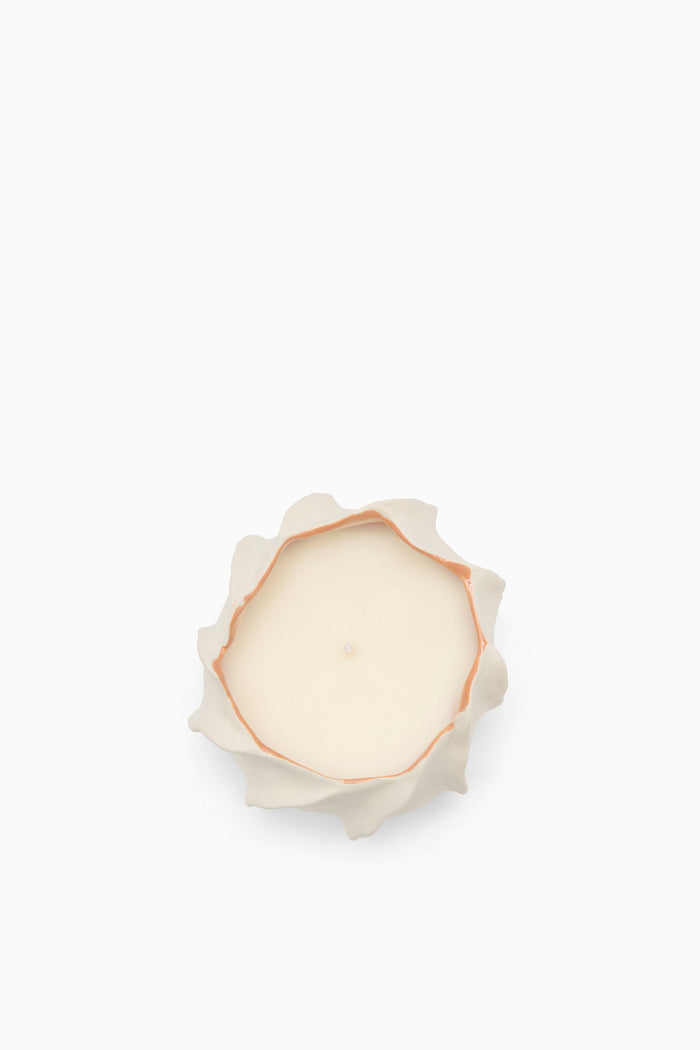 Cream Ceramic Luxury Candle in Floral Vessel - Top-Down View Showing Wax and Wick | Ulla Johnson