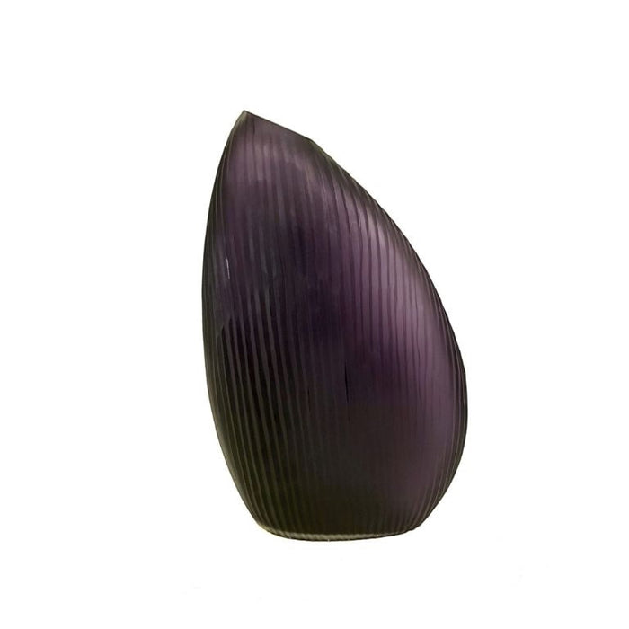 Eclectic violet ribbed glass vase with a contemporary asymmetrical sculptural silhouette and vertical texture.