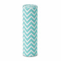 Eclectic Biddykins cotton flannel baby blanket in a turquoise and white chevron pattern, rolled for storage.